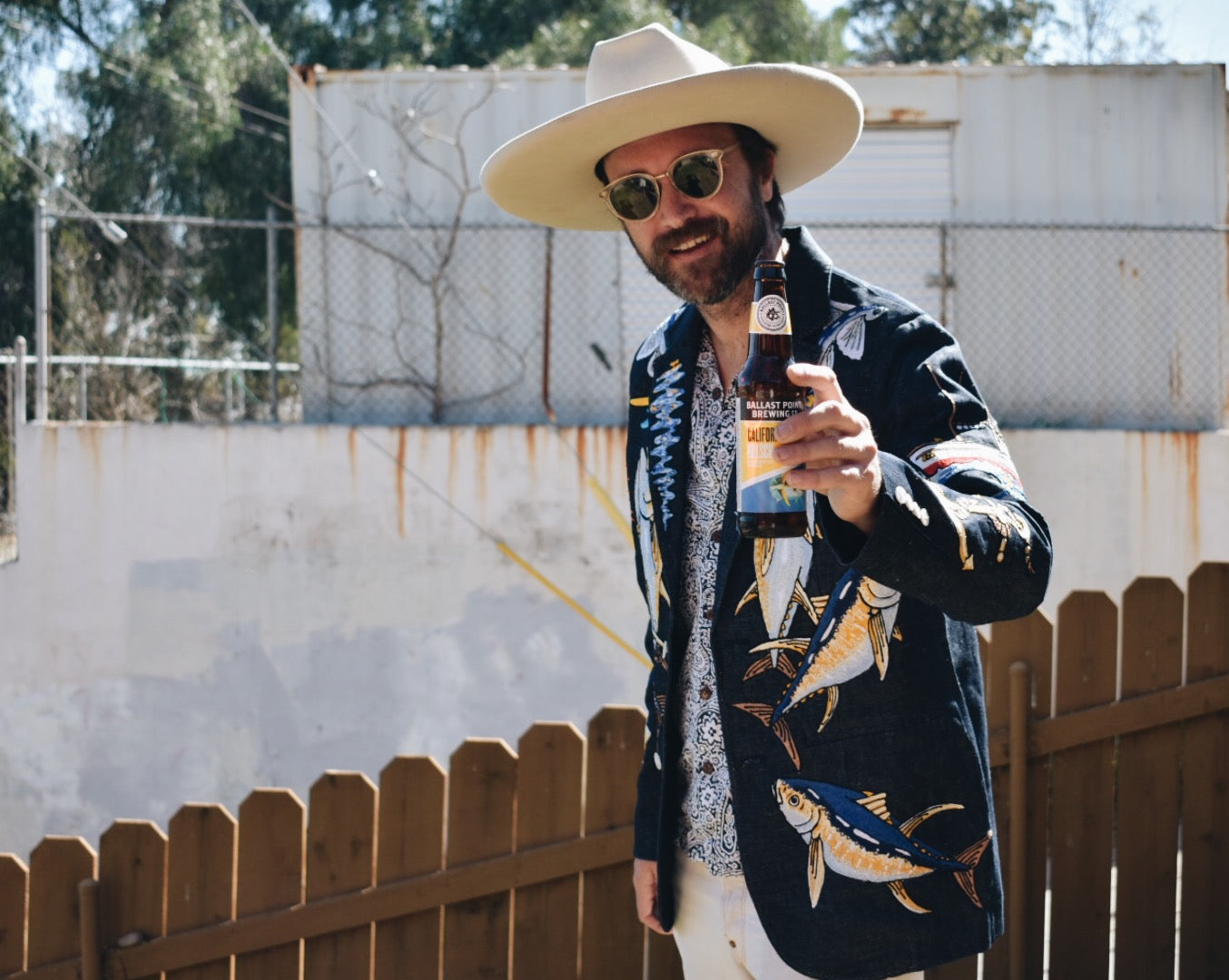 Man wearing custom fishing blazer by Rag Proper Overalls